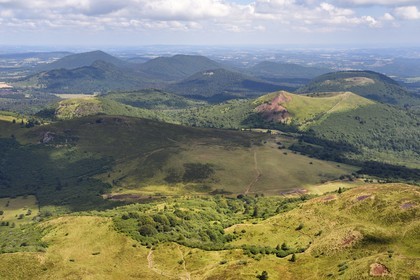 France, Puy de Dome, Parc Naturel Régional des Volcans d'Auvergne (regional nature park of Auvergne volcanoes), the northern part of the Chaine des Puys listed as World heritage by UNESCO, the path leading to the Traversin and the Puy Pariou crater