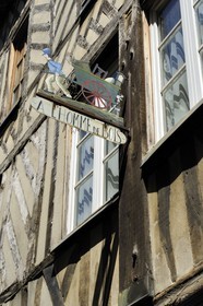 France, Calvados, Honfleur, sign on a traditional half-timbered house rue de l'Homme de Bois