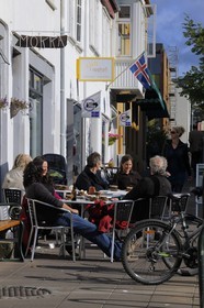 Iceland, Reykjavik, cafe terrace in Skolavordustigur street in the old town