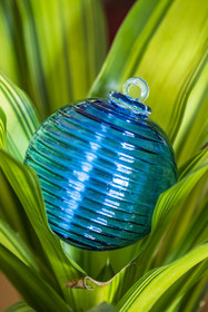 France, Moselle (57), Meisenthal, International Center for Glass Art (CIAV), handcrafted Grip Petrol Blue glass Christmas bauble from the 2025 collection