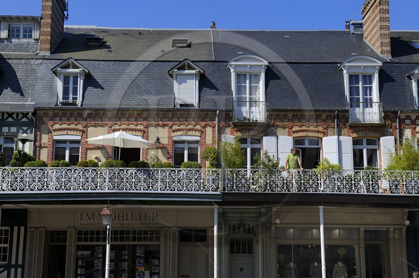 France, Calvados, Pays d'Auge, Deauville, shops under the arcades avenue Charles de Gaulle