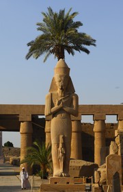 Egypt, Upper Egypt, Nile Valley, Luxor, Karnak Temple listed as World Heritage by UNESCO, the colossus of Ramesses II