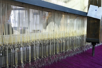 France, Var, Presqu'ile de Saint Tropez, Cogolin, the Manufacture Cogolin has been making rugs since 1924, most of them are woven by length on 19th century Jacquard hand looms, weaving raffia on a flat loom