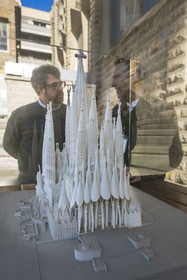 Spain, Catalonia, Barcelona, Eixample district, Sagrada Familia basilica by Catalan modernist architect Antoni Gaudi, listed as a UNESCO World Heritage Site, Xisco Llabrès, the architect in charge of the cloister construction site in front of the model which presents the Glory facade side