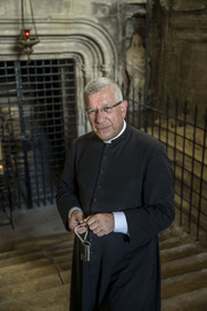 France, Bouches du Rhone, Tarascon, the royal collegiate church of Sainte-Marthe built in the 11th and 12th centuries, Father Michel Savalli in charge of the church