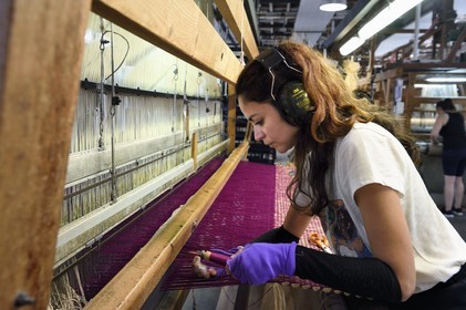 France, Var, Presqu'ile de Saint Tropez, Cogolin, the Manufacture Cogolin has been making rugs since 1924, most of them are woven by length on 19th century Jacquard hand looms, weaving raffia on a flat loom