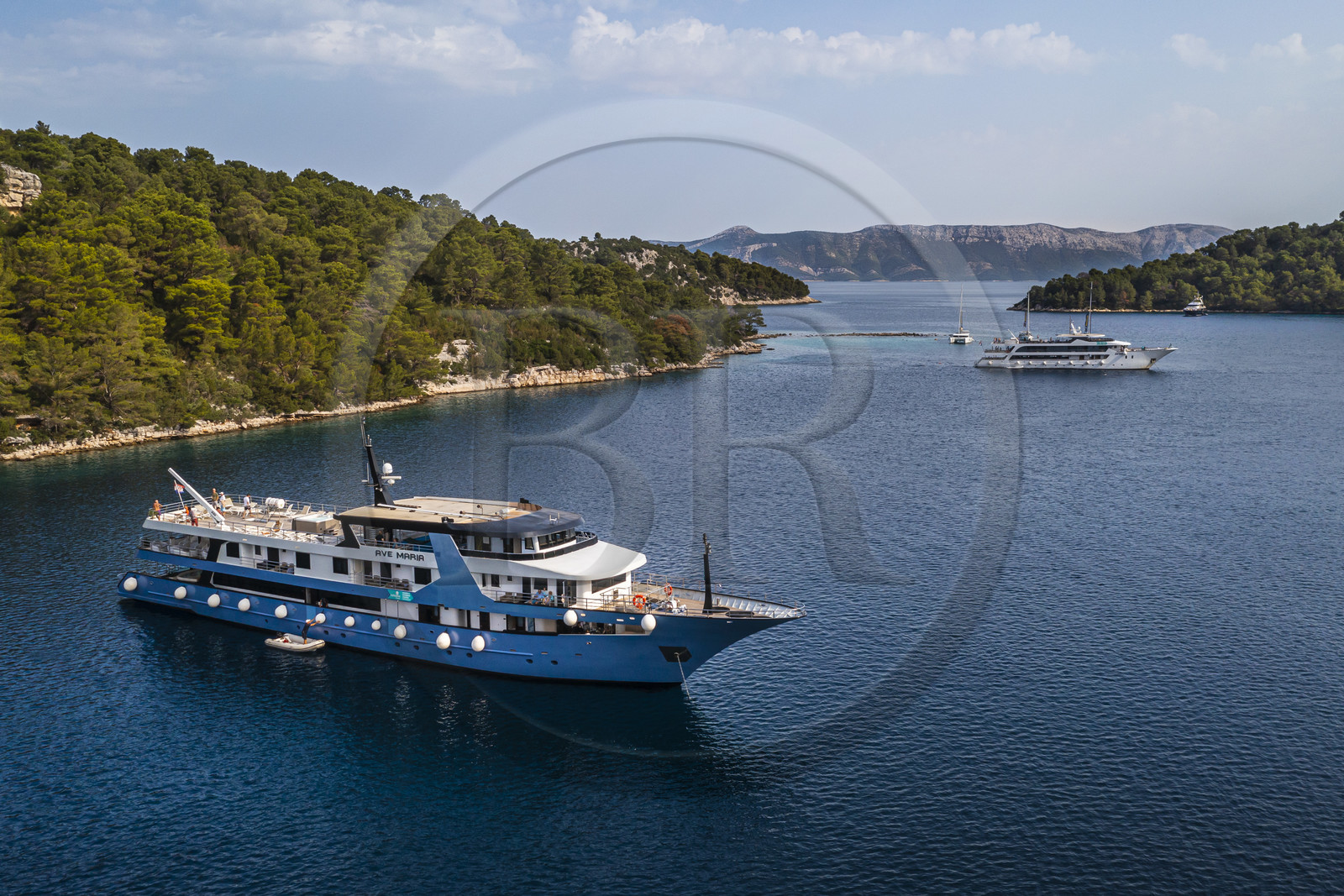 Croatia, Dalmatia, Dalmatian coast, Island of Mljet, National Park of Mljet, anchorage of a cruise ship in Polace Bay (aerial view)