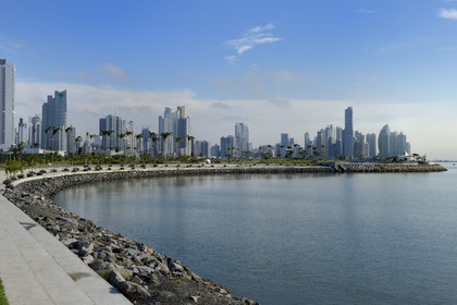 Panama, Panama City, the waterfront and skyscrapers seen from Avenida Balboa Cinta Costera, Colon point and the Trump tower in background right