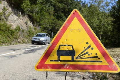 France, Corse du Sud, Alta Rocca, road sign pierced by bullets