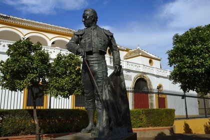 Spain, Andalusia, Seville, the Maestranza bullring (plaza de Toros), Statue of famous bullfighter Curro Romero