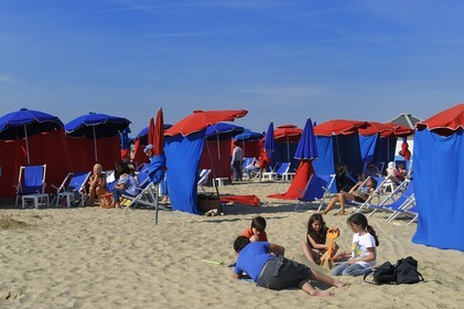 France, Calvados, Pays d'Auge, Deauville, the beach and its multicolored parasols