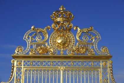 France, Yvelines, Chateau de Versailles, listed as World Heritage by UNESCO, detail of the Royal Gate drawn by Mansart (restored in June 2008) which separating the Royal Courtyard