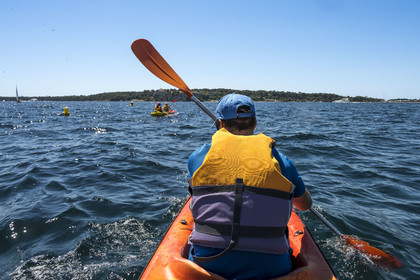 France, Alpes-Maritimes, Cannes, kayaking in the Lerins Islands, passage between Cap de la Croisette and Ile Sainte-Marguerite in the background