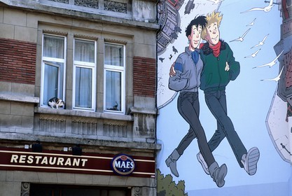 Belgium, Brussels, painted walls with famous belgium comics hero Broussaille from author Franck Pé in Plattesteen street
