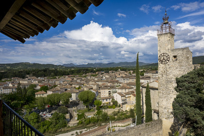 France, Vaucluse, Dentelles de Montmirail mountains,  Vaison la Romaine, the upper town (medieval city), belfry tower from the 14th - 18th century known as the Clock Tower seen from the Hotel du Beffroi