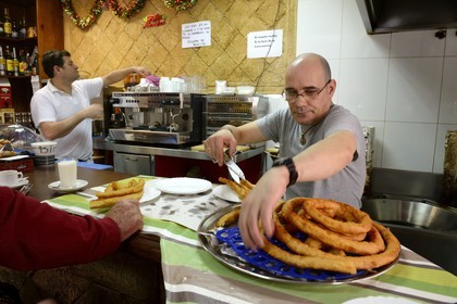 Spain, Andalusia, Almeria, churros for breakfast in a Café