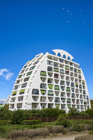 France, Herault, La Grande-Motte, labeled 20th century heritage, Couchant (setting sun) district west of the port, Le Poseidon building by architects Gilles and Jean Balladur, belonging to the so called bishops bonnet female architectural style