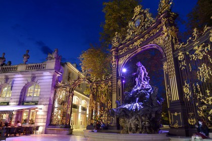 France, Meurthe-et-Moselle, Nancy, Place Stanislas (former Place Royale) built by Stanislas Leszczynski in the 18th century, listed as World Heritage by UNESCO, Amphitrite Fountain and golden gate by Jean Lamour