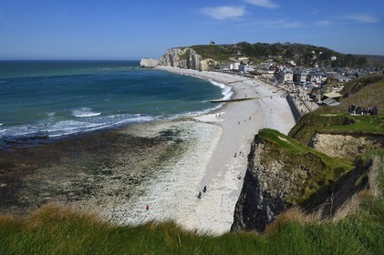 France, Seine-Maritime, Pays de Caux, Alabaster Coast (Cote d'Albatre), Etretat, the beach and Amont cliff overlooked by the Notre-Dame-de-la-Garde church
