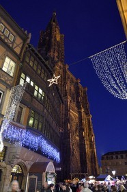 France, Bas Rhin, Strasbourg, old town listed as World Heritage by UNESCO, Place de la Cathedrale, the Maison Kammerzell built in the 15th-16th century converted to a hotel and restaurant, Notre Dame Cathedral in the background