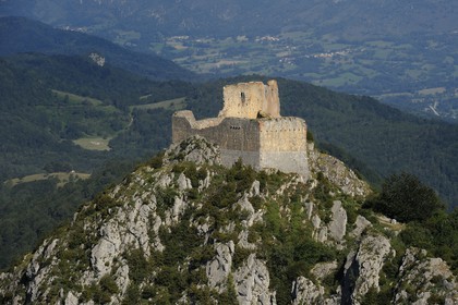 France, Ariege, Pays d' Olmes, Cathar Castle of Montsegur perched on a rock and the Pyrenees (aerial view)