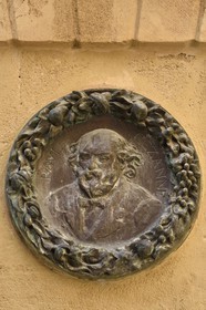 France, Bouches du Rhone, Aix en Provence, Fontaine des Bagniers at the junction of Rue des Bagniers and Rue des Chapeliers, medallion with Paul Cezanne based on Renoir's drawing