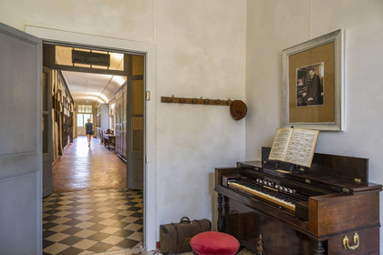 France, Bouches du Rhone, Regional Natural Park of the Alpilles, Saint Remy de Provence, Saint-Paul-de-Mausole monastery, the historic psychiatric asylum the Maison de santé Saint-Paul where Van Gogh was interned in 1889-1890, furnished room of Doctor Schweitzer and his wife, political prisoners interned in 1918