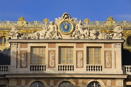 France, Yvelines, Chateau de Versailles, listed as World Heritage by UNESCO, clock of the Cour de Marbre (Marble Courtyard) renovated in 2008