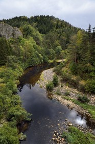 France, Haute Loire, Loire river Valley, Salettes, hiker along the banks of the Loire river at the Pont de Soubrey