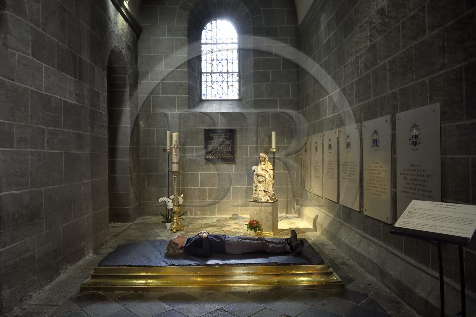 France, Haute Loire, Le Puy en Velay, Routes of Santiago de Compostela, the 12th century Our Lady (Notre-Dame-de-l'Annunciation) cathedral listed as World heritage by UNESCO, Chapel of the Holy Crucifix, large phonolith slab called the Stone of Fevers or Stone of Apparitions (of the Virgin) France, Haute Loire, Le Puy en Velay, Routes of Santiago de Compostela, the 12th century Our Lady (Notre-Dame-de-l'Annunciation) cathedral listed as World heritage by UNESCO, Chapel of the Holy Crucifix, large phonolith slab called the Stone of Fevers or Stone of Apparitions (of the Virgin)