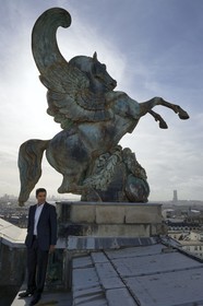 France, Paris, winged horse statue on the roof of the Opera Garnier and the chief concierge Gilles Djeraouane