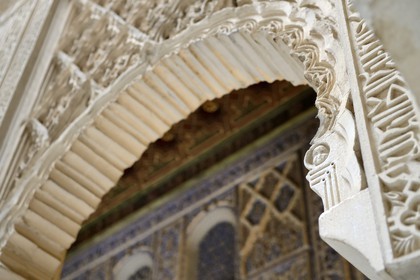 Spain, Andalusia, Seville, the Alcazar of Seville (Reales Alcazares de Sevilla), listed as World Heritage by UNESCO, Patio of the Dolls (Patio de las Munecas), the small head which gives its name to the patio proves that it is not Islamic Art