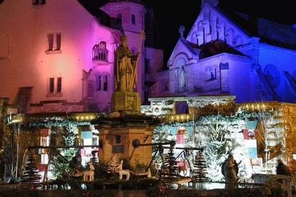 France, Haut Rhin, Eguisheim, labelized Les Plus Beaux Villages de France (the Most Beautiful Villages of France), the Saint-Léon fountain on the Place du Chateau, Christmas lights and decorations