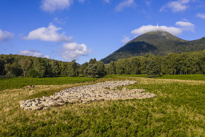 France, Puy de Dome, Parc Naturel Régional des Volcans d'Auvergne (regional nature park of Auvergne volcanoes), Chaine des Puys listed as World heritage by UNESCO, the two shepherdesses Ostiane and Charlotte keeping a flock of Rava sheep at the foot of the Puy de Dôme volcano (aerial view)