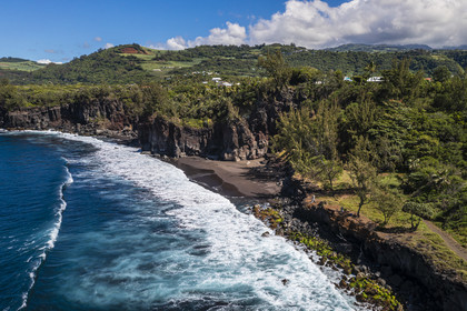 France, Reunion island (French overseas department), Saint Joseph, Ti Sable beach, black sand beach bordered by a volcanic lava cliff (aerial view)