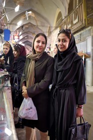 Iran, Isfahan Province, Isfahan, Bazar-e Bozorg (Great Bazaar), young Iranian woman and her mother