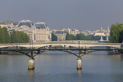 France, Paris, the Seine river banks listed as World Heritage by UNESCO, the passerelle bridge) des Arts and the National Museum of Orsay, housed in the old Gare d'Orsay (1898)