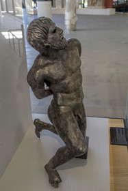 France, Bouches du Rhone, Arles, musée départemental Arles antique, bronze statue of a captive (last quarter of the 1st century BC) found during the excavations of the Rhone in 2007, probably one of the elements of a trophy decorating a public monument