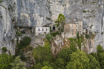 France, Var, Plan d'Aups Sainte Baume, Sainte-Baume Regional Nature Park, Sainte Baume massif, the cave sanctuary of Sainte Marie-Madeleine (St. Mary Magdalene) on the side of the 300m cliff (aerial view)