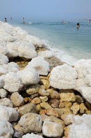 Israel, Southern District, swimmers at Ein Gedi Beach on the Dead Sea, saline concretions