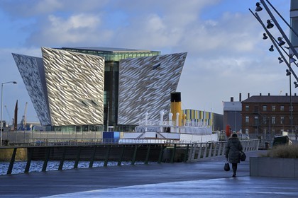 United Kingdom, Northern Ireland, Belfast, the new Titanic Quarter of Queen's Island, the SS Nomadic of the White Star Line built as a tender to the liners RMS Olympic and RMS Titanic, and the Titanic Belfast Experience center in the background