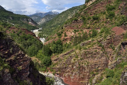 France, Alpes Maritimes, Mercantour National Park, Haut Var Valley, Gorges of Daluis carved by the Var river in red lutite soil seen from the Bride Bridge