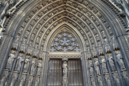 France, Seine Maritime, Rouen,  Church of Saint Ouen (12th–15th century), the central portal of the western facade, composed of Christ on the central pillar of the great door surrounded by the apostles