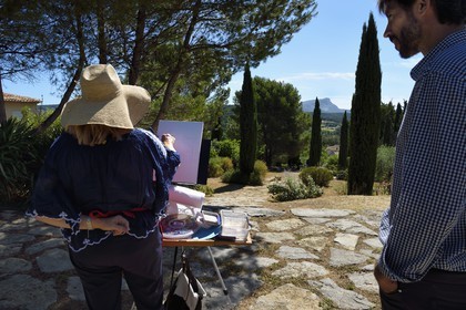 France, Bouches du Rhone, Aix en Provence, artist painter at the Painters' Field, the most famous paintings by Paul Cézanne have been painted from this panorama on the Sainte-Victoire mountain, located on the Marguerite Road on the Lauves hill