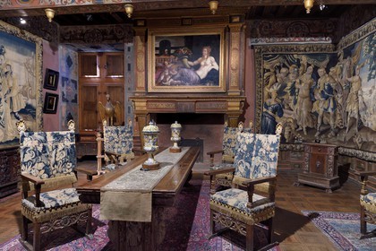 France, Dordogne, Perigord Vert, Bourdeilles, Bourdeilles Castle, Renaissance castle, the fair gilded ceremonial room that has a large collection furniture