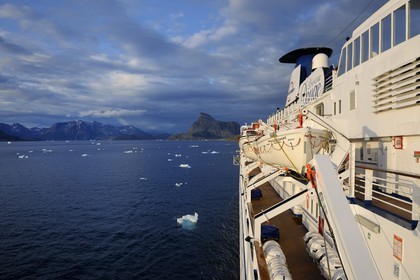 Greenland, Nanortalik Fjord, Princess Danae cruise ship moving between the icebergs