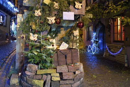 France, Haut Rhin, Eguisheim, labelized Les Plus Beaux Villages de France (the Most Beautiful Villages of France), mailbox for Santa Claus in the Ruelle des Remparts, Christmas lights and decorations