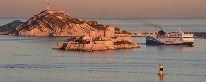France, Bouches du Rhone, Marseille, Calanques National Park, archipelago of Frioul islands, La Meridionale Ferry arriving from Corsica and the Chateau d'If in the foreground
