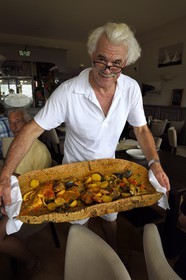 France, Var, le Rayol-Canadel-sur-Mer, Maurin des Maures Restaurant, the patron Dede Delmonte and his bouillabaisse served in an oak bark