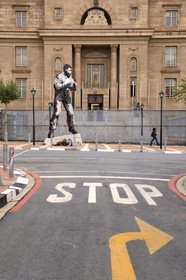 South Africa, Gauteng Province, Johannesburg, CBD (Central Business District), Ferreirasdorp in Westgate Precinct, shadow boxing sculpture depicting former President Nelson Mandela exhibiting his boxing skills in his younger days situated opposite Chancellor House and based on a picture taken by Drum magazine photographer Bob Gosani in the 1950s